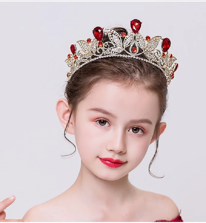 DIDEYTTAWL Luxurious Kids Crown Headpiece, Ornately Embellished with Shimmering Crystals and Rich-Hued Gemstones.