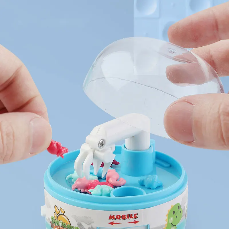 

Mini Claw Machine 8 Tiny Stuff Prizes Dinosaur Gashapon Toy Claw Toy Fingertip Toy Birthday Gifts for Boys and Girls