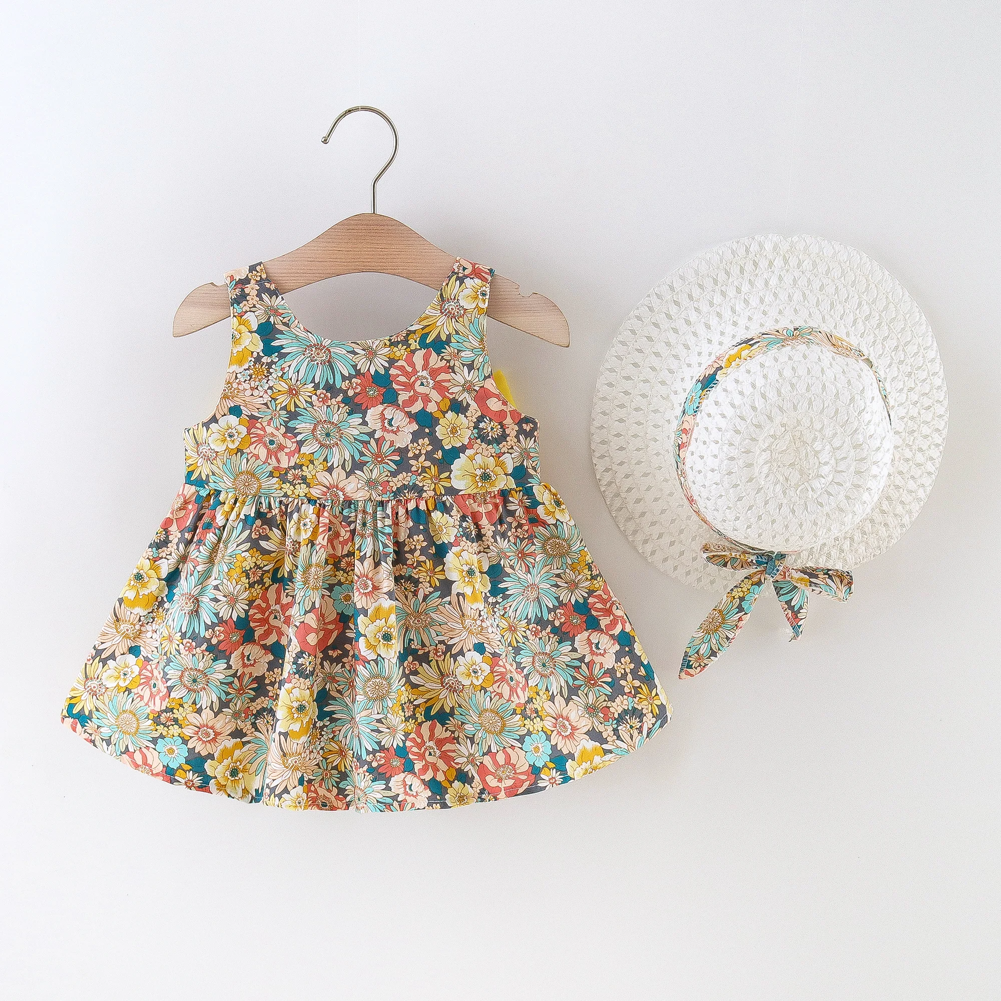 Description Picture 4 of item2/piece set of girl dresses and hats summer girl big bow various flower prints suspender princess dresses