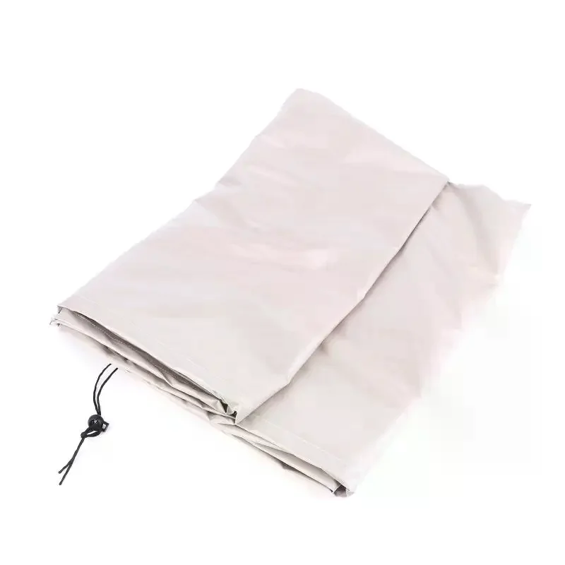 Housse de protection pluie pour drone T50, installée sur un drone agricole en extérieur.
