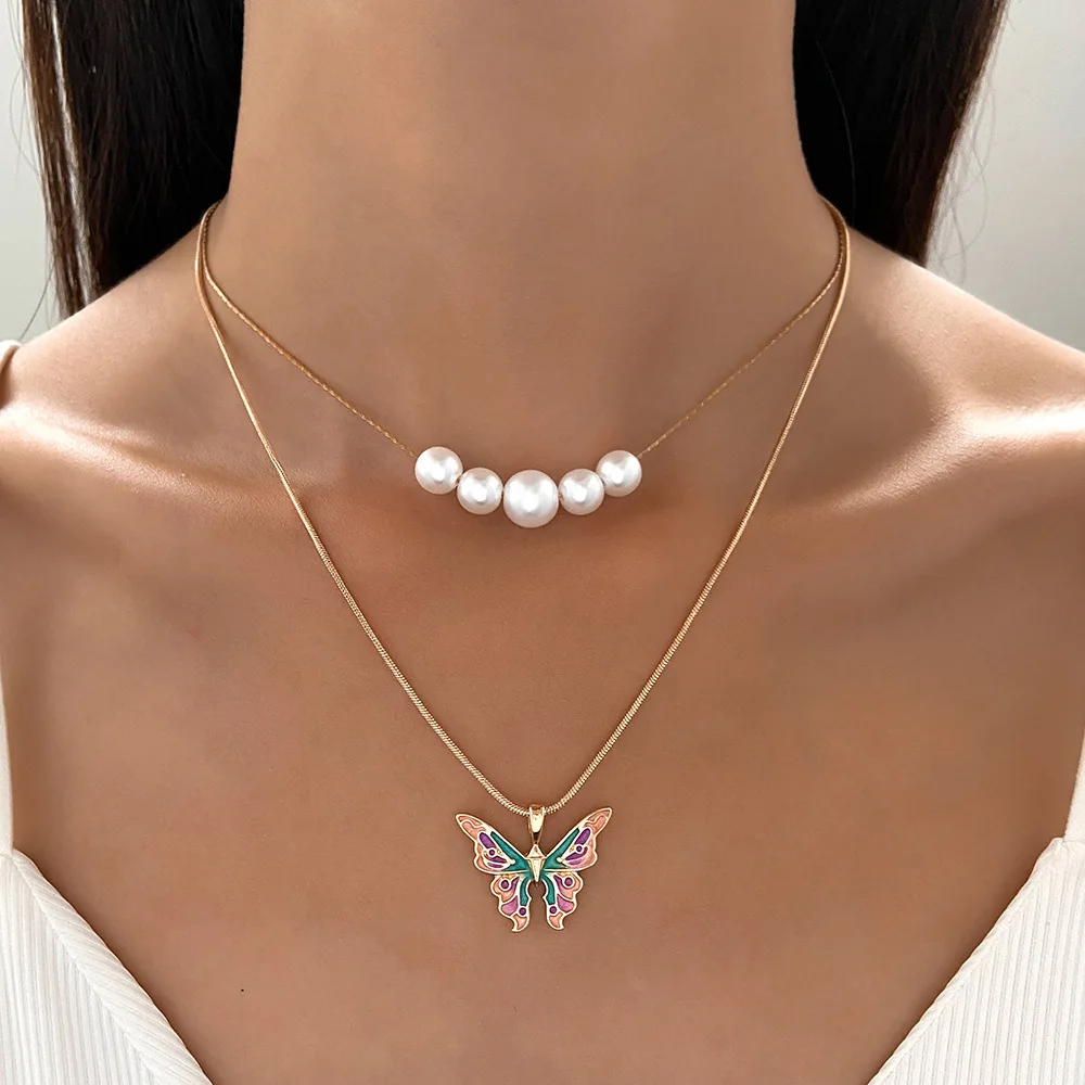 

QUKE Barbiecore pearl butterfly metal necklace