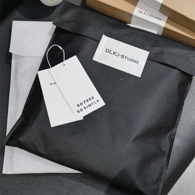 50pcs Thickened Non-woven Fabric Bag With Handle Large Capacity T-shirt Packaging Clothing Store Special Gift Bag 4