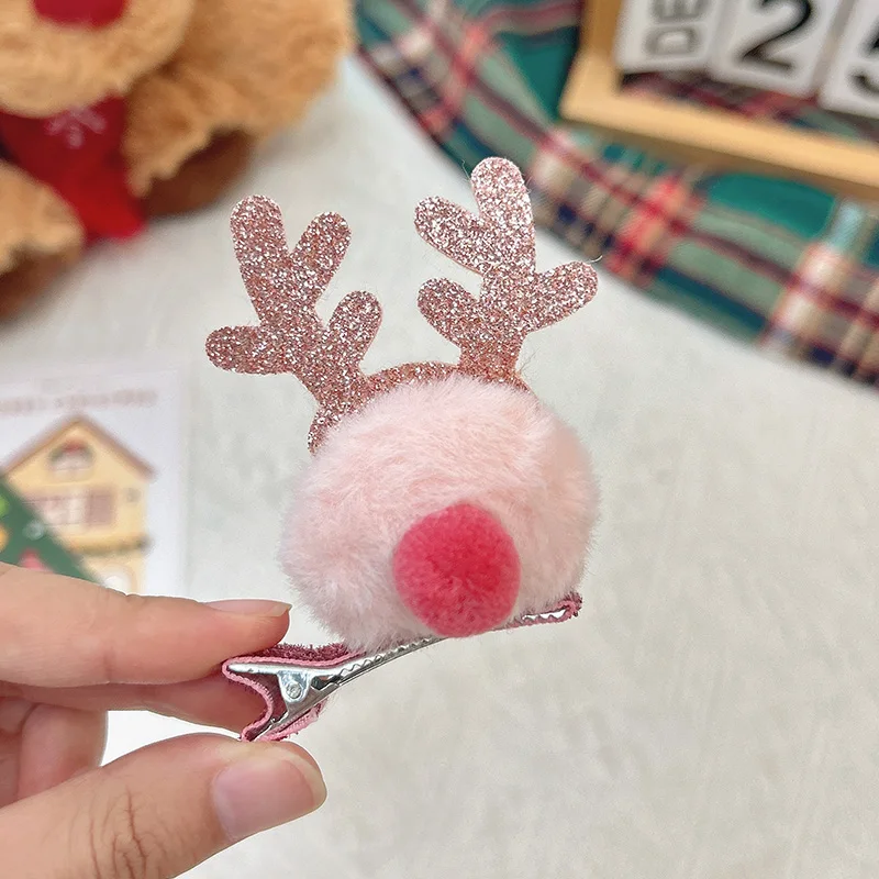 Pink pom pom antler clip