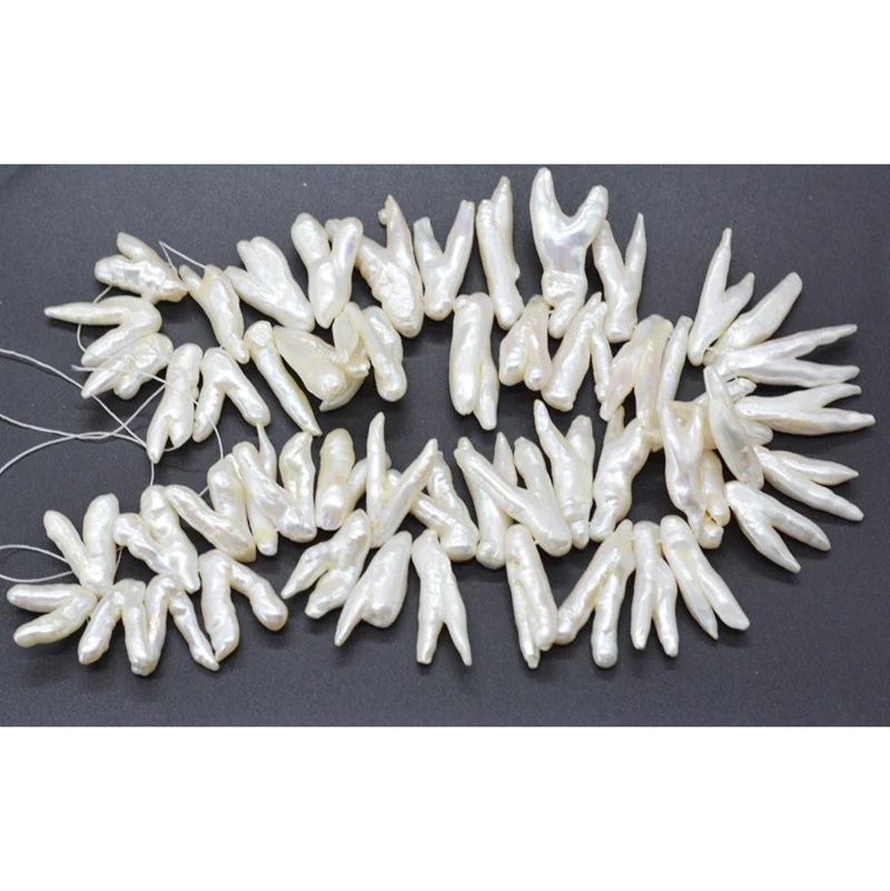 

Exquisite. Unique. Natural white chicken feet shaped baroque pearl. Limited edition, loose beads 15“