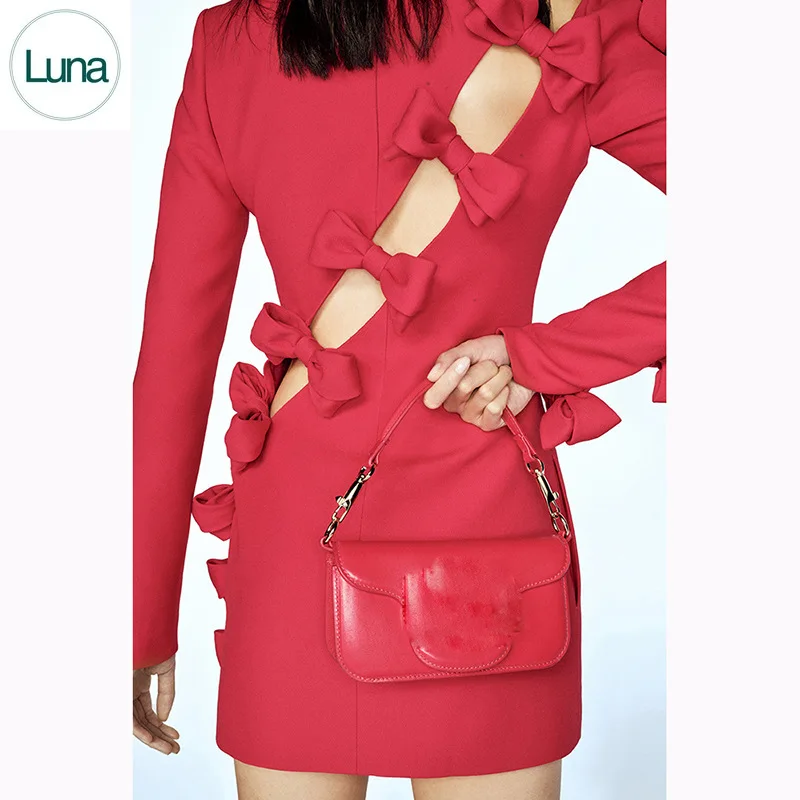 

Spot 2023 early autumn new European and American stars fashion personality asymmetry hollow bow dress small dress