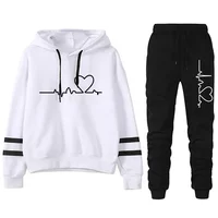 Survêtement femme décontracté rayure polyvalent sweat noir pantalons de survêtement ample imprimé haute qualité tenues une pièce sweat à capuche pantalon 2