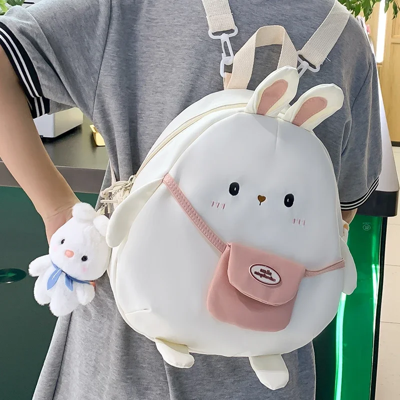 

Teenage Girl Kawaii Backpack White Nylon Cloth Soft Portable Rabbit Shape Children Schoolbag Bunny Pendant Chic Cartoon Knapsack