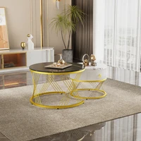 Table basse élégante assemblée, ensemble de 2 pièces, aspect marbre, décor doré, table d'appoint avec tiroirs, meubles de salon 5