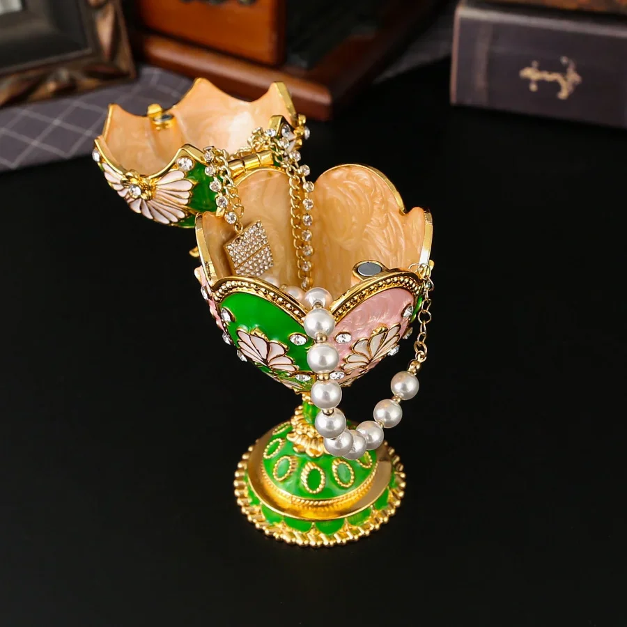 Eine eiförmige Schmuckschatulle, Aufbewahrungsbox für den Schreibtisch mit Diamanten, geeignet als Geschenk zum Valentinstag oder anderen Feiertagen._voghion.com