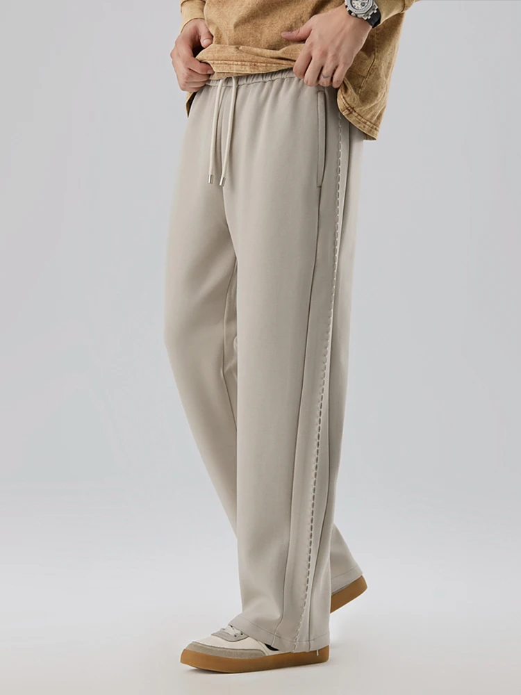 2025 Autunno Nuovi pantaloni sportivi in cotone pesante da uomo Tessuto strato d'aria di alta qualità Pantaloni sportivi dritti vestibilità ampia Pantaloni in maglia drappeggiati 3