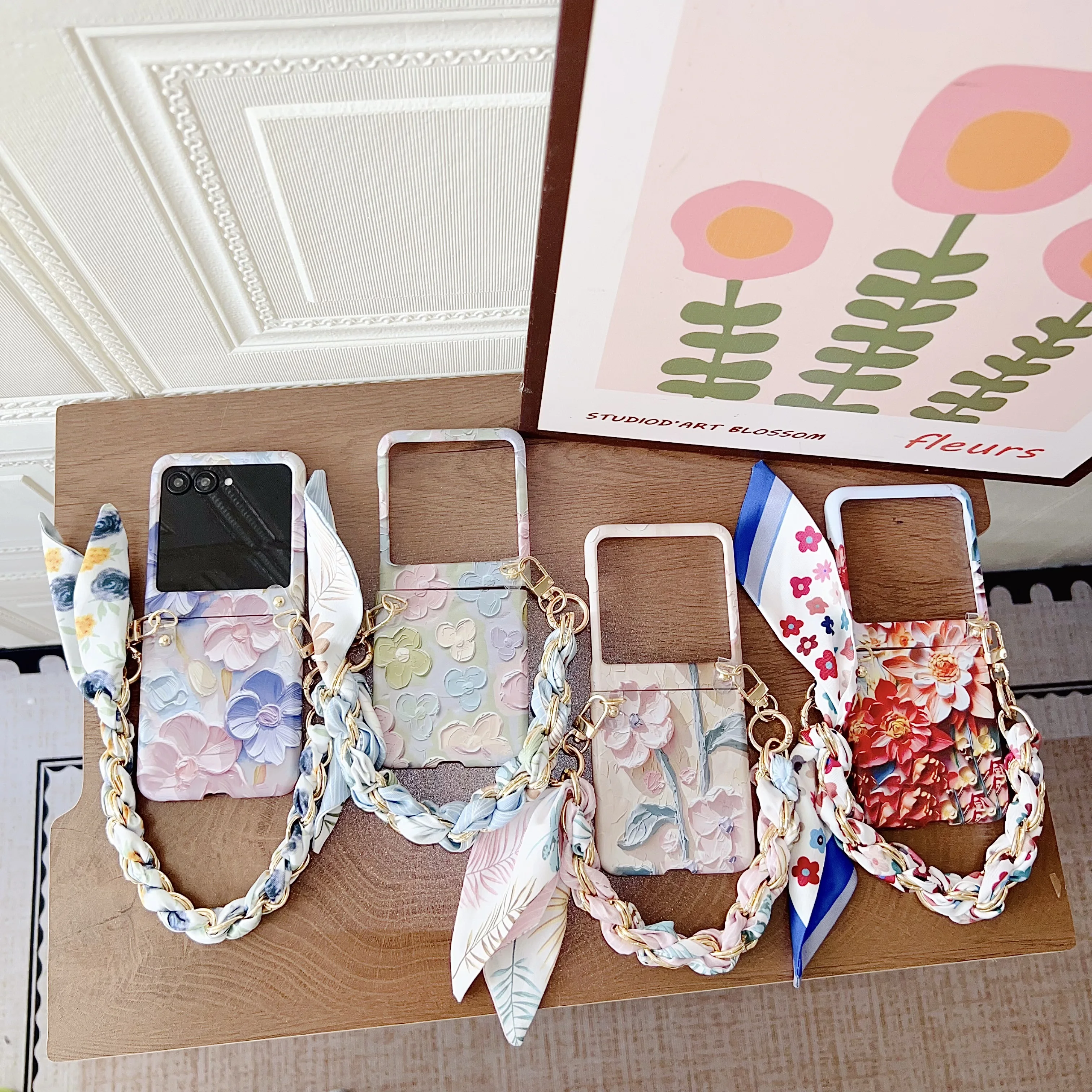 Floral Embossed Shockproof Hard Cover with Wrist Strap