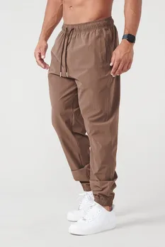 Primavera e autunno nuovi uomini sportivi Casual da corsa esercizio sciolto elastico cravatta marrone pantaloni ad asciugatura rapida 1