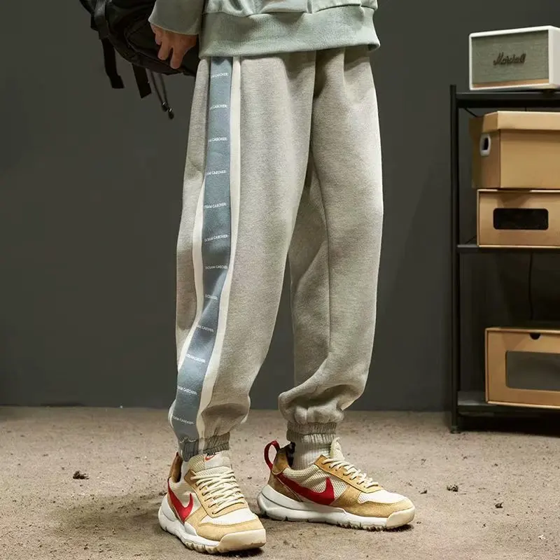 

2022 Men Woman Casual Trousers Spring Autumn Hip Hop Elastic Waist Harem Pants Male Fashion Loose Sweatpants Men Pants S-4XL