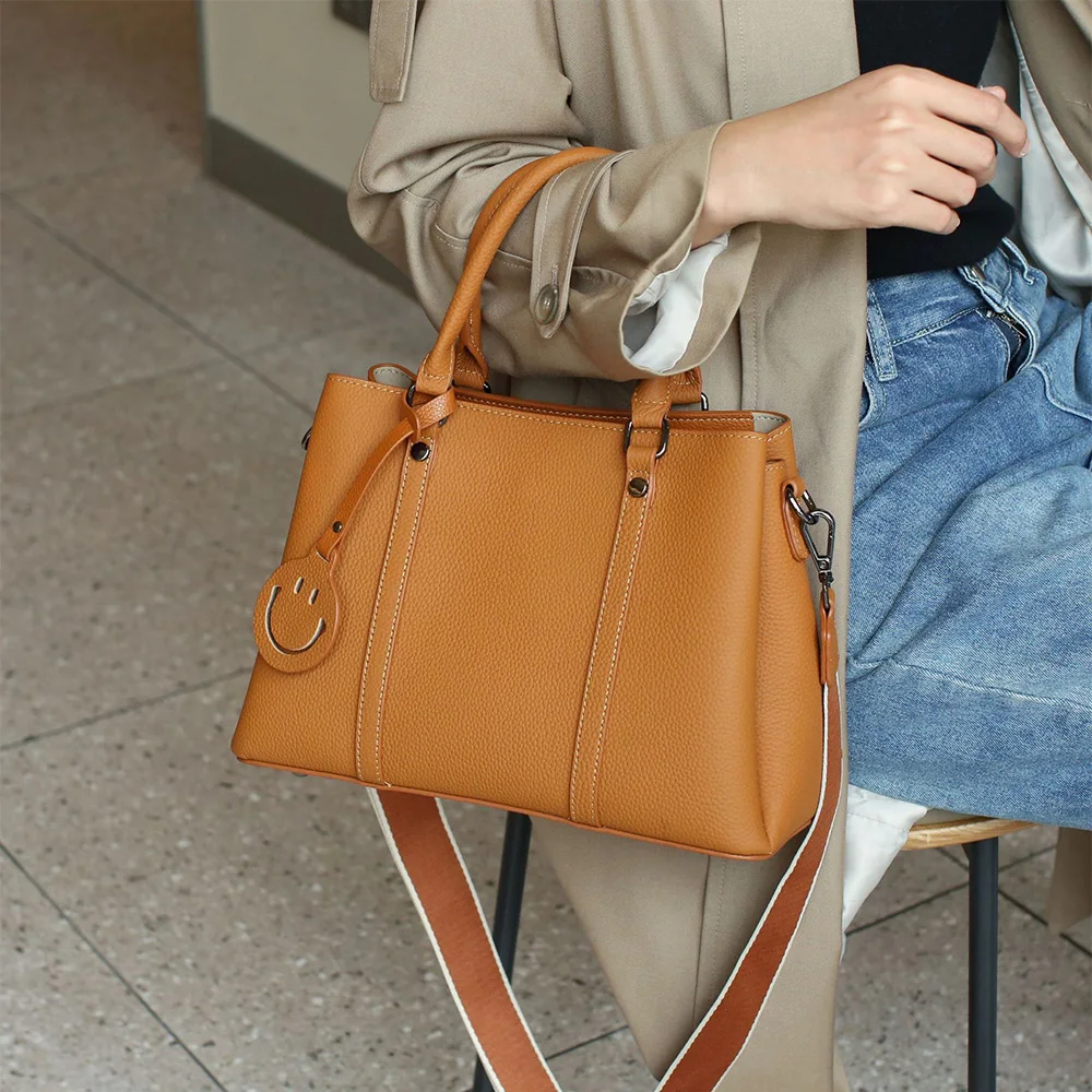 

2023 Genuine Leather Women Handbags Wide Strap Cowhide Shoulder Bag Smile Face Deco Ladies Tote Bags OL Commute Shopping Bag