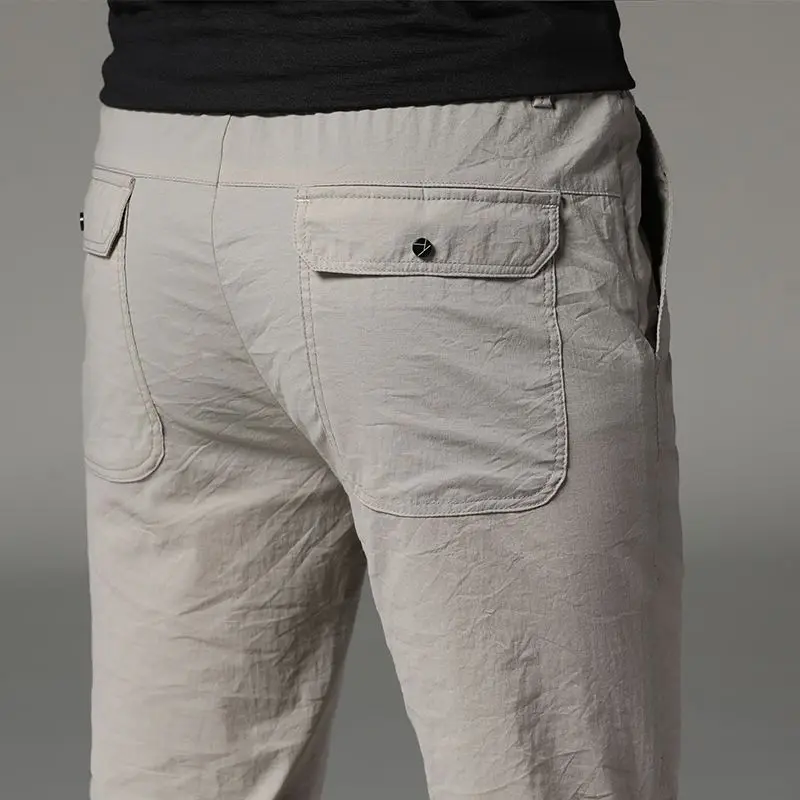 Summer Men Thin Business Casual Slim Straight Pants Streetwear Fashion Elastic Waist Breathable Big Size Zipper Pockets Trousers