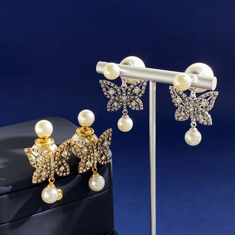 Donia Jewelry Fashion New Butterfly Titanium Steel Micro-Inlaid AAA Zircon Silver Needle Luxury Palace Pearl Earrings.