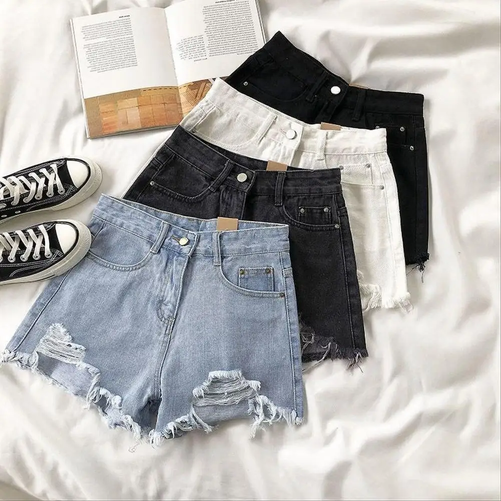 Vintage high-waisted denim shorts for women, vintage style, ripped jeans, slim fit, high waist, small, summer.