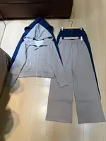 Fermeture éclair de couleur unie avec chapeau veste courte taille haute décontractée pantalon à jambes larges ensemble deux pièces trajet rétro nouvel ensemble pour femmes 2