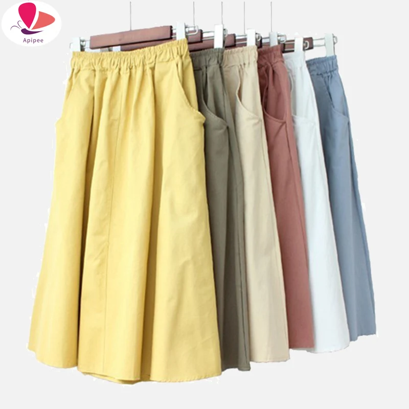 

Women's High Waist Side Pockets Skirts Spring Summer Solid A-line Female Midi Skirts 2023 Fashion Elastic Waists Ladies Bottom