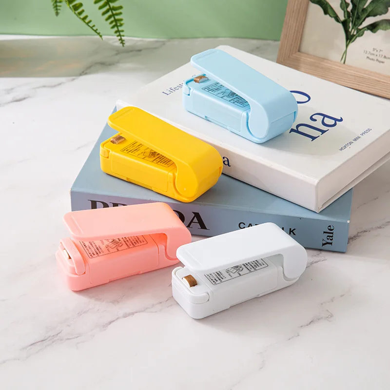

Portable Bag Heat Sealer Plastic Package Storage Bag Clip Mini Sealing Machine Handy Sticker Seal for Food Snack Kitchen Gadgets