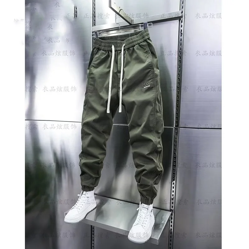 Spring Autumn Solid Color Fashion Elastic Waist Haren Pants Man Korean Style High Street Pockets Patchwork Drawstring Trousers