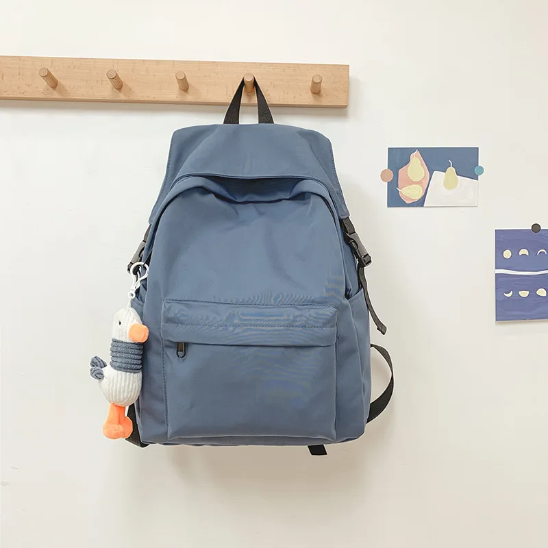 thumbnail image 1 of Mochila escolar de nailon de gran capacidad para estudiantes de secundaria, mochilas japonesas para estudiantes de secundaria, mochilas sencillas de ocio, 1 of 5