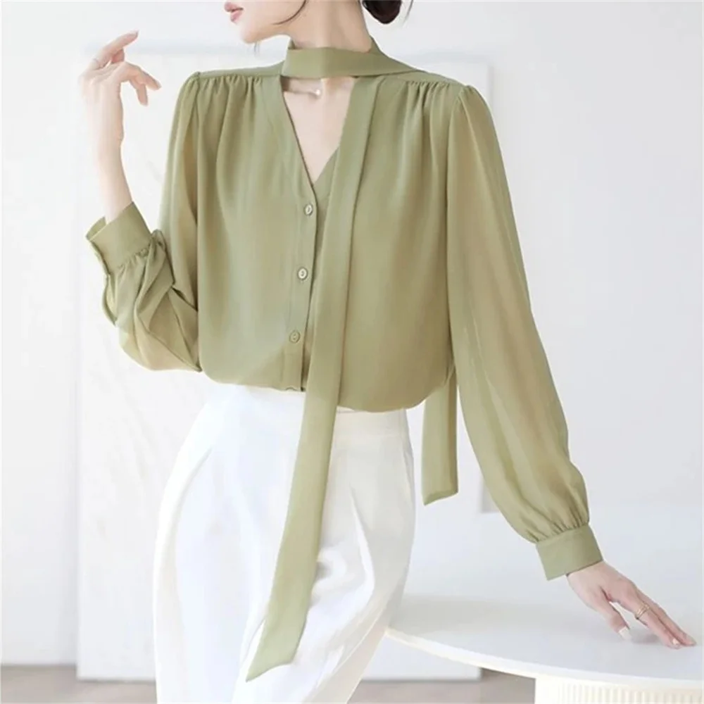 Korean version of exotic sweet long sleeved pearl button blouse  6441 main image 0