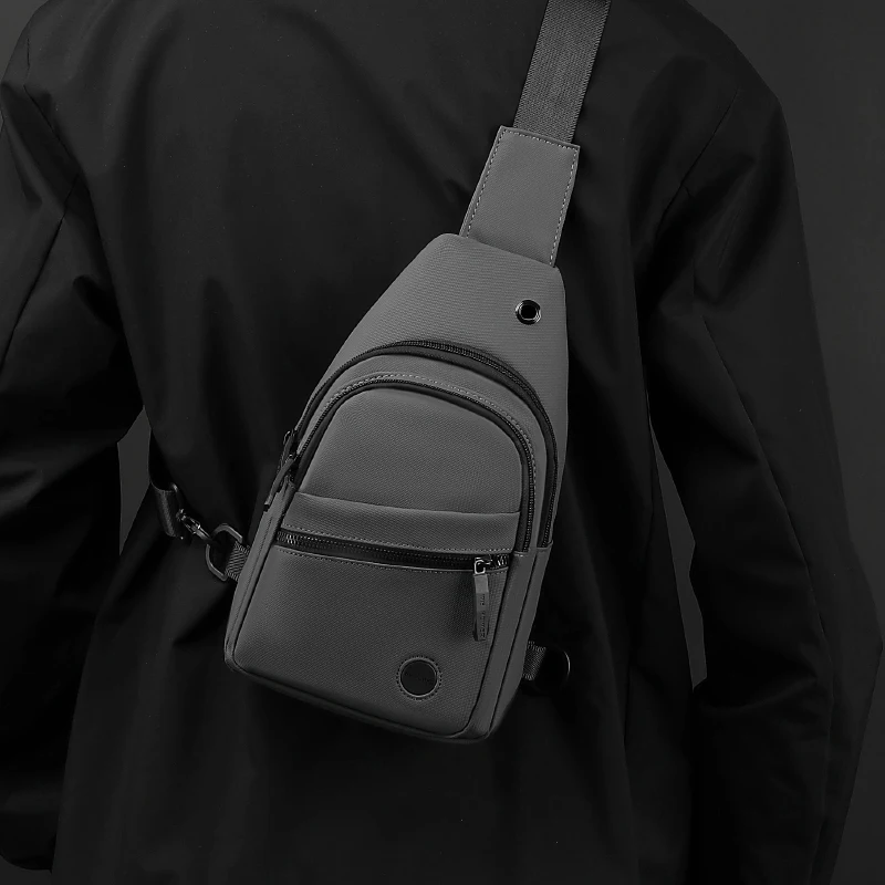 Men's chest bag, crossbody bag with mobile phone pocket, adjustable shoulder strap, multiple pockets, suitable for sports and tr