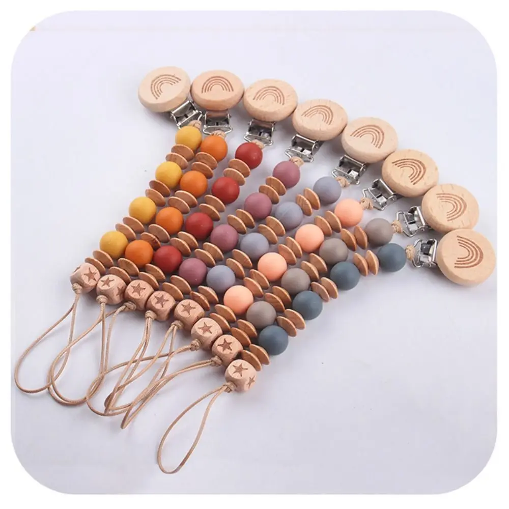

Dummy Clips Pacifier Holder Clips Soother Holder Wood Baby Pacifier Chain Nipple Holder Clips Rainbow Baby Teether Toys Straps