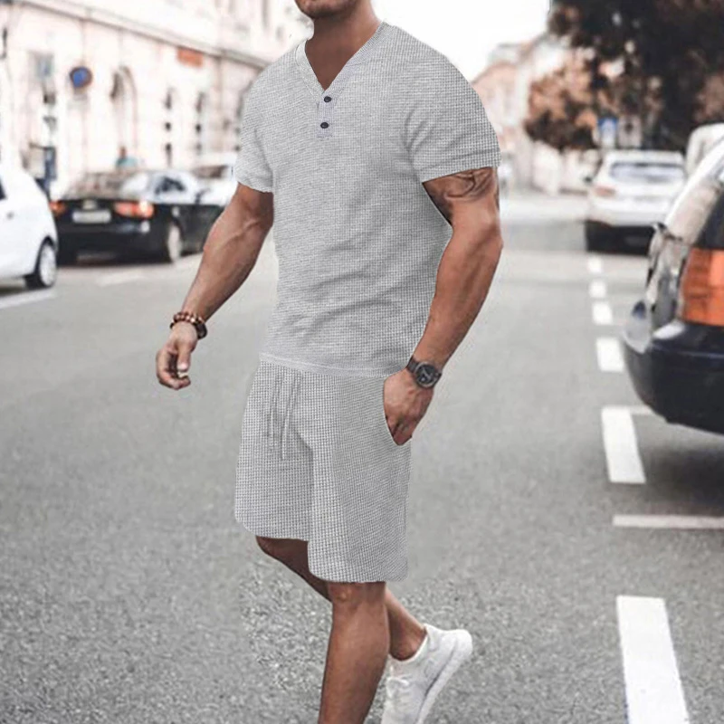 

2023 Men's Suit Fashion Solid Color Waffle V-Neck Short Sleeve T-Shirt Lace-Up Shorts Two-piece Summer Casual Suit Sports Suit