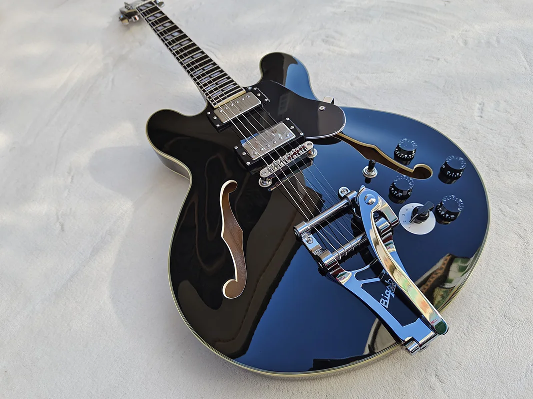 

In stock - Semi-hollow jazz electric guitar, rosewood fingerboard, larye vibrato system, 5-speed adjustable
