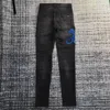 me embroidery python snake distressed jeans 2