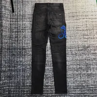 me embroidery python snake distressed jeans 2