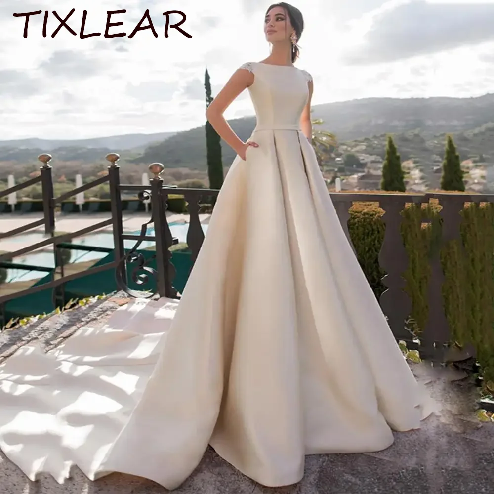 

TIXLEAR A-Line Wedding dress for Women Simple Charming O-Neck Illusion Lace Applique Covered Button Court Train robe de mariée