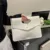 أبيض