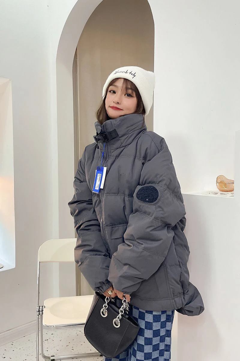 Рисунок 4 - Пуховик женский средней длины на