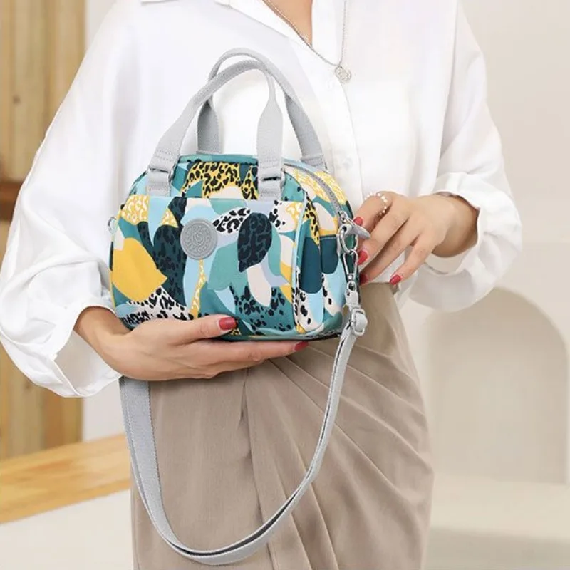 

2024 New Handbag Nylon Small Bag Women's Handheld Mini Crossbody Waterproof Crossbody Bags Fashion Versatile Trendy Cloth Bag