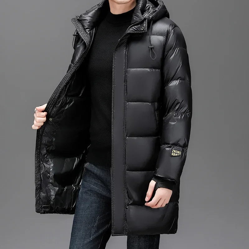 thumbnail image 1 of 2024 Nueva ropa de diseñador de lujo de invierno Chaqueta larga de plumón Ropa de protección contra el frío Chaqueta con capucha negra gruesa y cálida para hombre, 1 of 5