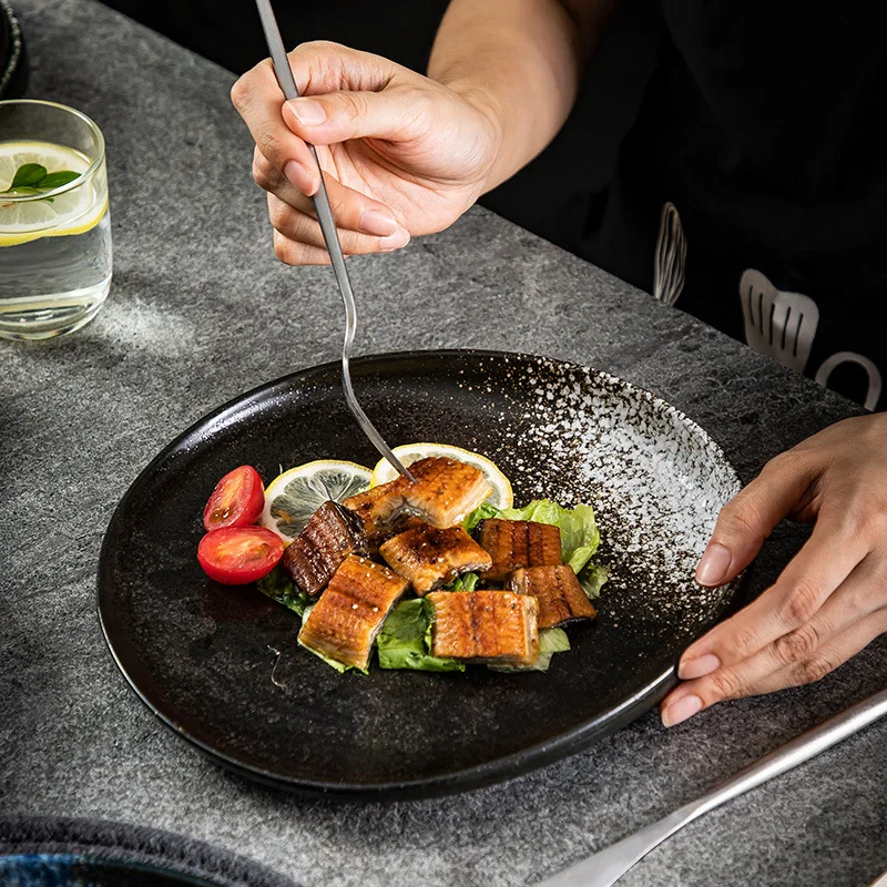 

Japanese-style dishes personalized creative ceramic retro tableware irregular dishes shallow dishes creative steak dishes.