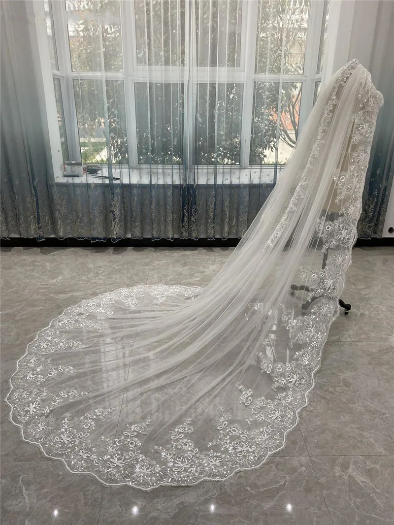 https://ae01.alicdn.com/kf/S990b187502a7415c9f6a1dac519bc101q/Luxury-Cathedral-Length-Bridal-Veils-One-Layer-White-or-Ivory-3m-3-5-Meters-4m-5m.jpg