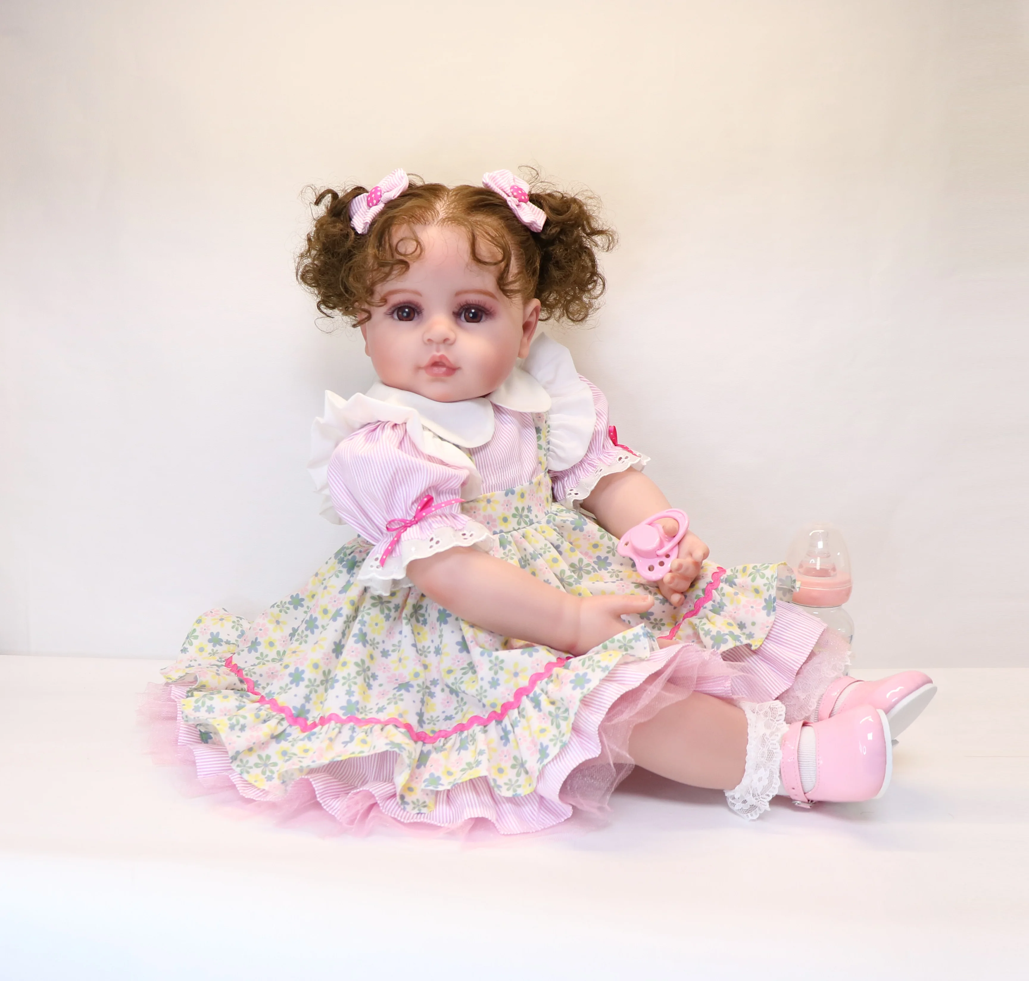 

24 inch Lovely Reborn Baby Girl Dolls Toddler Realistic Looking Life Like Baby Doll Soft Vinyl Brown Curly Hair Babies Toy