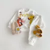 2024 Spring Autumn New Hot Selling Sweater Set Boys And Girls Fashion Trend Tops Pants Cartoon Printed Simba Children's Clothing 1