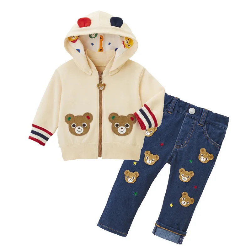 Coat showing removable hood and printed lining