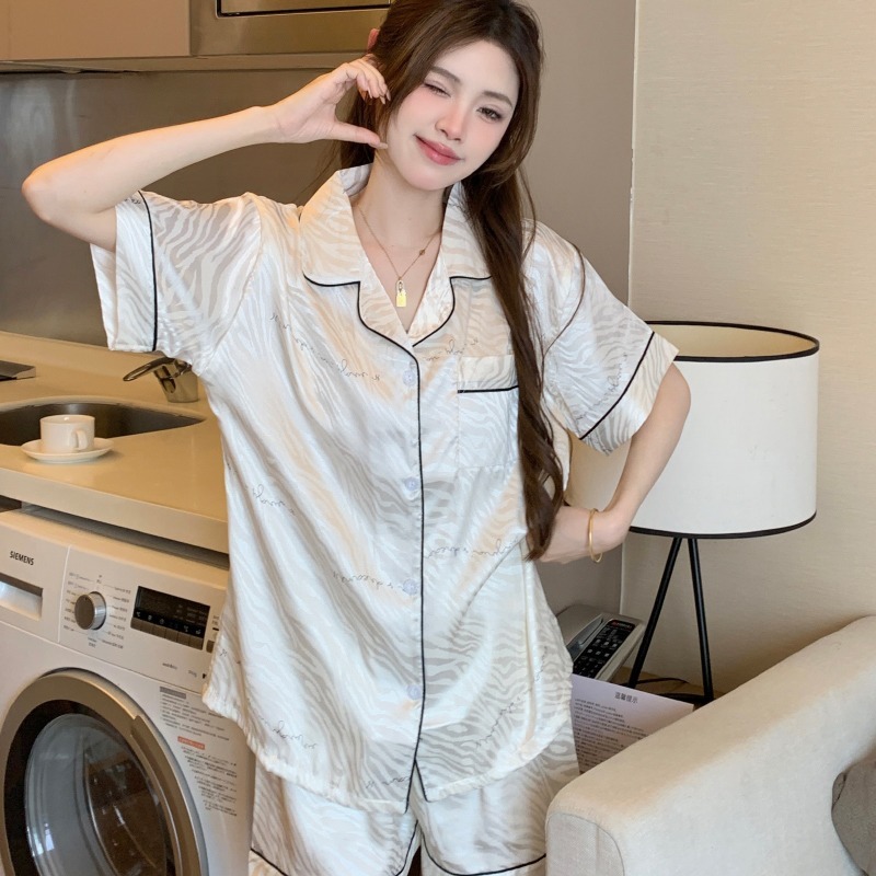 Loose comfortable simple solid color women's pajamas summer 2025 new short-sleeved shorts lapel girls homewear two-piece suit