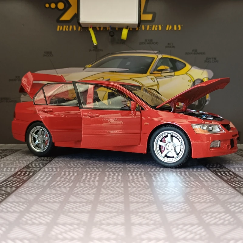 1:24 Scale Alloy Mitsubishi EVO 9 Supercar Model with Sound, Light, and Openable Doors