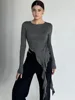 Women's autumn slim fit irregular tassel solid color new long sleeved O-neck shirt slim fit top women's streetwear