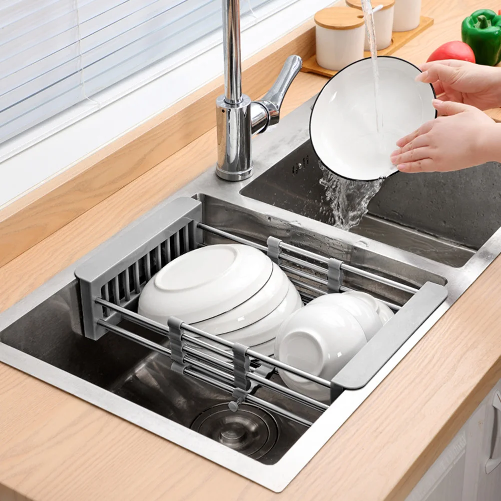 https://ae01.alicdn.com/kf/S995551a8f2a34821aaa1ae39571078d4U/Adjustable-Sink-Dish-Drainers-Drain-Basket-Kitchen-Organizer-Rustproof-Stainless-Steel-Over-Sink-Extendable-Dish-Drying.jpg