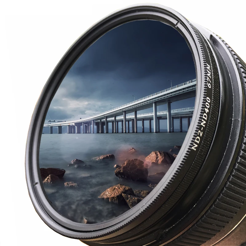 Filtre ND variable professionnel pour objectif photo, posé sur fond blanc, reflet lumineux sur le verre.