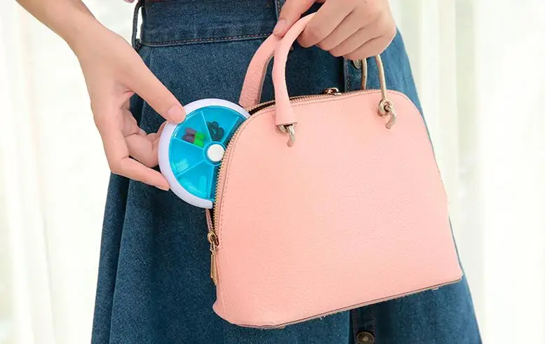 Creative multifunction round seven lattice rotation PCS portable 7, 7 days a week week plastic portable small boxes