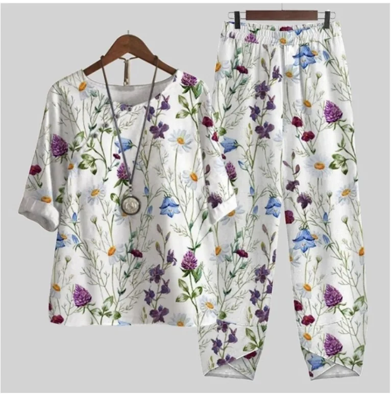 Women's casual printed two-piece set with O-neck pullover top and matching long pants for summer holidays and everyday wear.001